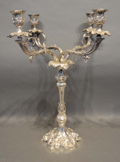 A Silver Plated Four Branch Candelabrum with scroll arms and...