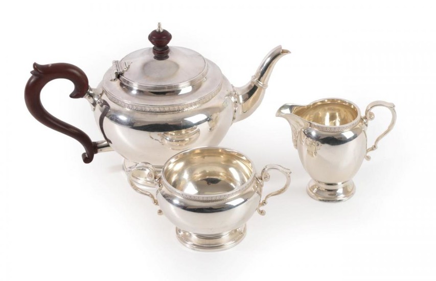 A Three-Piece George V Silver Tea-Service, by The Goldsmiths and...