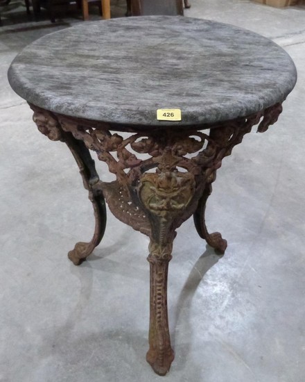 A Victorian cast iron pub table pierced with foliage and cas...