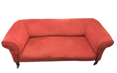 A Victorian chesterfield style sofa, with wide back and...