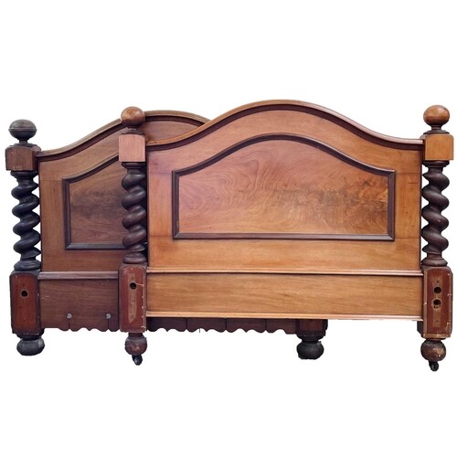A Victorian mahogany bed frame, the head and footboard with ...