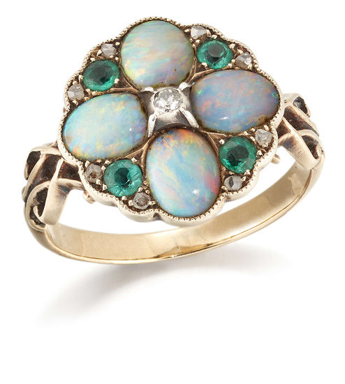 A Victorian opal and diamond cluster ring, the central silver...