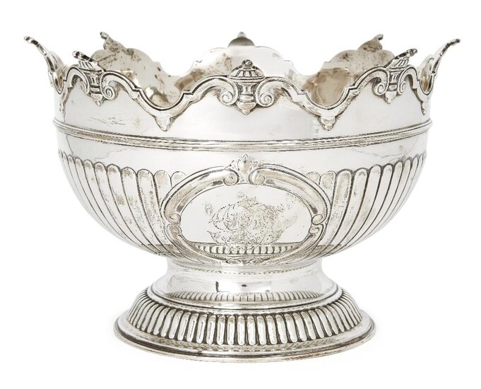 A Victorian silver Monteith punch bowl, Birmingham, 1892, Elkington & Co., raised on a circular foot, the vertically fluted sides with monogrammed cartouche to shaped scrollwork rim, 17.5cm high, 27cm dia., approx. weight 32oz