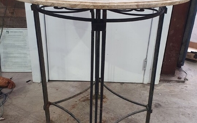 A WROUGHT IRON AND MARBLE TOP CENTRE TABLE