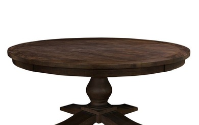 A contemporary round pedestal dining table