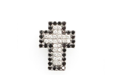 A cross diamond pendant set with numerous brilliant-cut black and white diamonds...