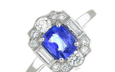A cushion-shape sapphire and vari-cut diamond cluster ring.