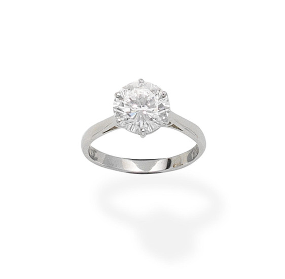A diamond single-stone ring,, 1986