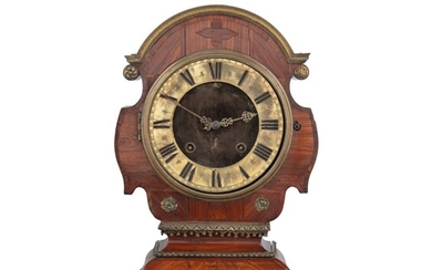A gilt bronze, kingwood and amaranth "Tête de poupée" clock, French Regence, circa 1720 | Pendule tête de poupée en placage de bois de violette et d'amarante, bonze doré, Régence, vers 1720