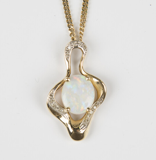 A gold, opal and diamond pendant in a pierced abstract openwork design, claw set with the oval opal