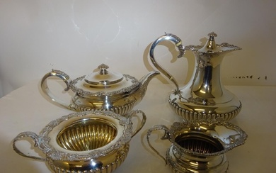 A good English silver four piece tea & coffee service with f...
