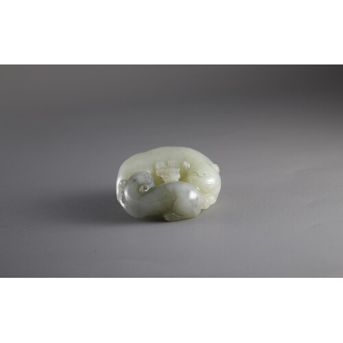 A grey and celadon Jade 'Cats' Group, 19th Century W: 5.2cm,...