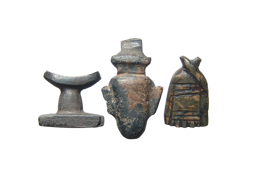 A group of 3 Egyptian stone amulets, Late Period