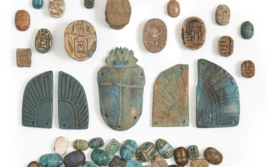 A group of 45 steatite and hardstone Egyptian scarabs and scarabeoids, New Kingdom and later, including a scarabeoid surmounted by four frogs and a winged funerary scarab (45) Provenance: The winged funerary scarab ex-Julian Bird collection; the...