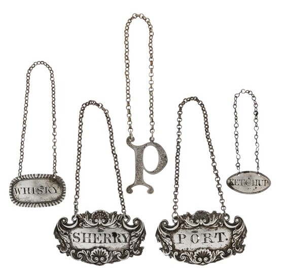 A group of Georgian and Victorian silver decanter labels comprising: two Scottish examples by Elder & Co., one reading 'Sherry', the other 'Port', 6.1cm wide; a Victorian label in the shape of the letter 'P', London, 1857, Charles Rawlings &...