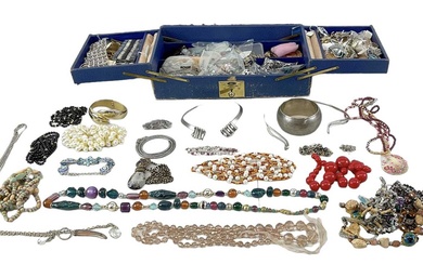 A large quantity of costume jewellery including bangles, rings, brooches,...