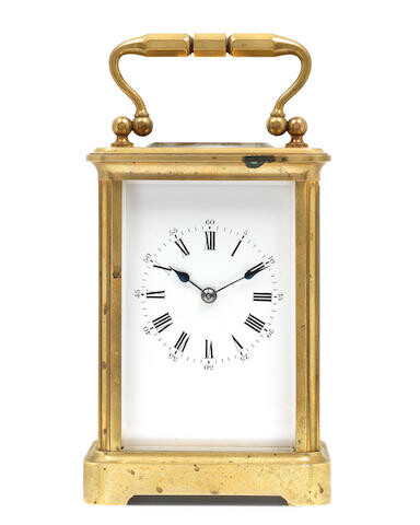 A late 19th century gilt brass corniche carriage clock with original travelling case marked A.Dumas 3