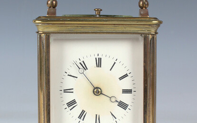A late 19th century/early 20th century French brass cased carriage clock with eight day movement str