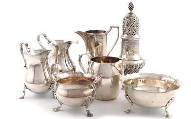 A mixed lot of silver items, various dates and makers, comprising: a George II cream jug, maker~s mark W?, London 1753, baluster form, wavy-edge border, leaf capped scroll handle, a cream jug of octagonal tapering form, by The Barnards, London 1907, a...