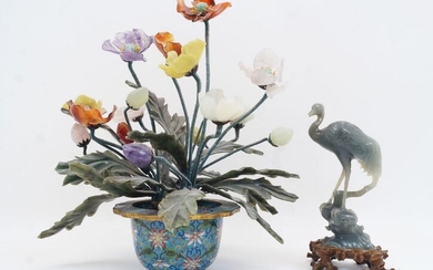 A modern Chinese hardstone flowering tree, with variously coloured stone leaves and buds, issuing from a cloisonne flowerpot, 38cm high; together with a hardstone model of a crane, with fitted carved hardwood base, 23.5cm high (2)