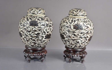 A pair of 19th Century crackle glaze jars and covers