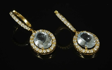 A pair of Continental white gold aquamarine and diamond drop earrings