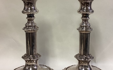 A pair of Old Sheffield silver plated telescopic candlesticks.