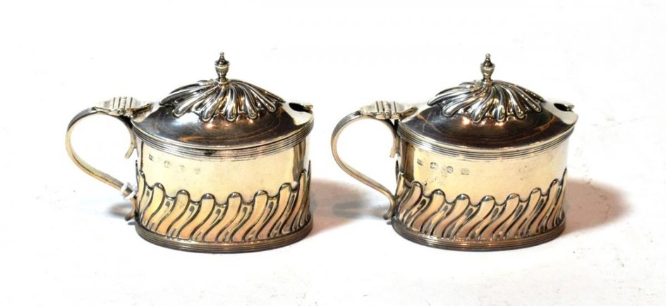 A pair of Victorian silver mustard-pots, by Samuel Walton Smith,...