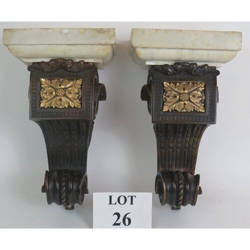 A pair of antique heavy bronze and marble wall corbels, each...