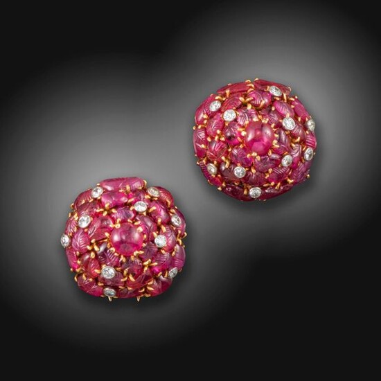 A pair of carved ruby bombe earrings by Henri Lavabre,...