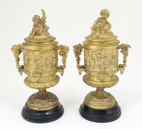 A pair of late 19thC Continental gilt lidded pedestal
