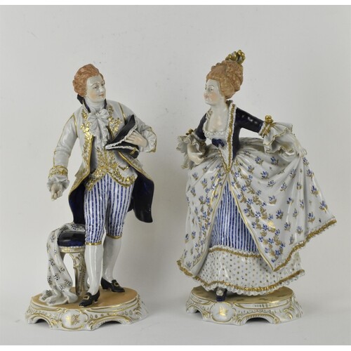 A pair of late 19th/early 20th century Dresden porcelain fig...