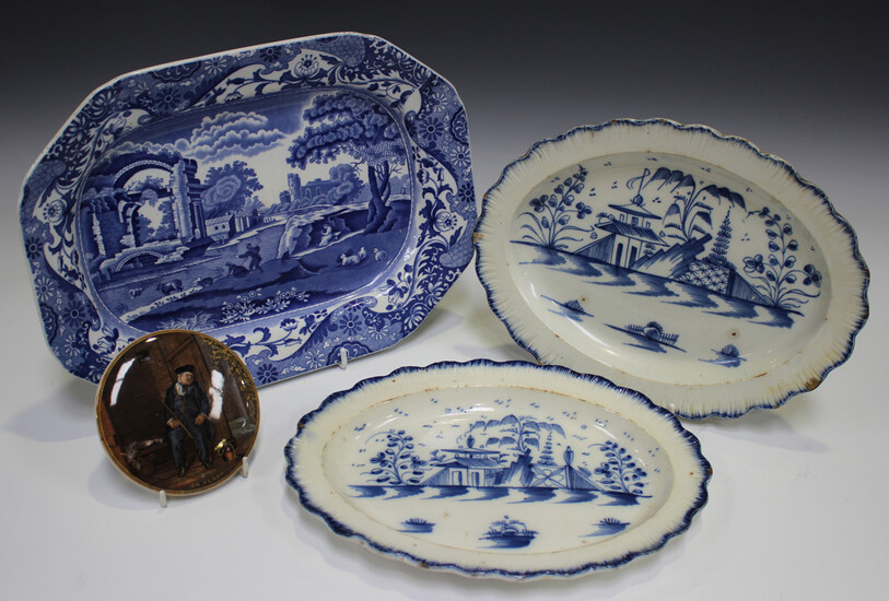 A pair of pearlware oval dishes, late 18th/early 19th century, painted in blue with a chinoiserie la
