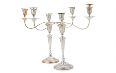 A pair of silver three light circular candelabra by Mappin & Webb