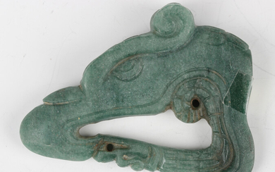A pre-Columbian Mayan style green hardstone carving, probably 400-800 AD, modelled as the head of a