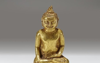 A rare miniature Southeast Asian gold repousse figure