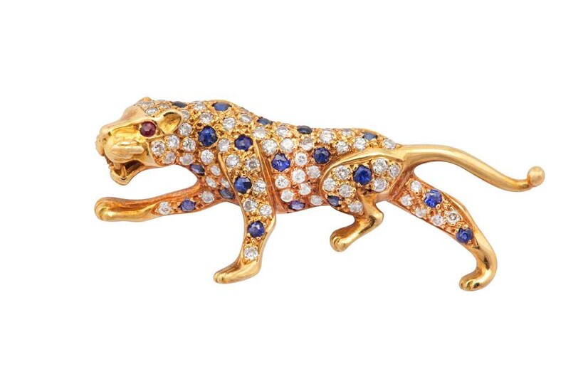 A sapphire, ruby and diamond panther brooch