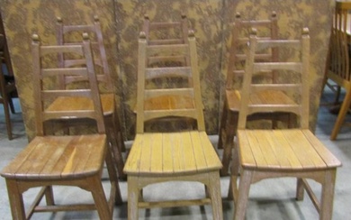 A set of six arts and crafts style oak chairs by Webbers of ...
