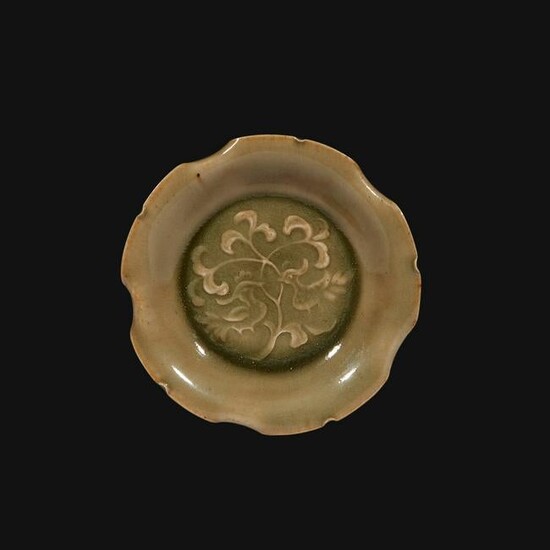 A small Yaozhou molded and carved lobed celadon dish