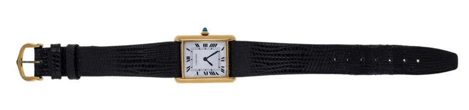 A tank wristwatch, by Cartier, the white dial with Roman black numerals, secret signature at 7 0'clock and blued steel hands, signed Cartier, the seventeen jewelled lever movement signed Cartier, cabochon sapphire crown, Swiss hallmarks, the case...