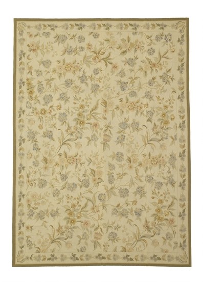 A woven carpet in classical French Aubusson style with flowers and foliage. 21st century. 373×270 cm.