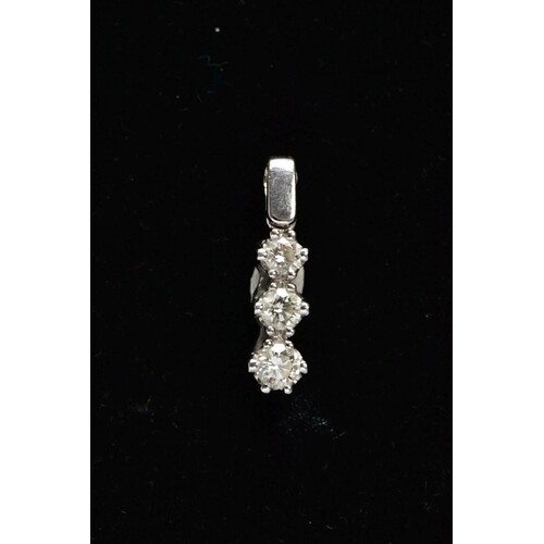 AN 18CT WHITE GOLD, DIAMOND PENDANT, designed with a row of ...