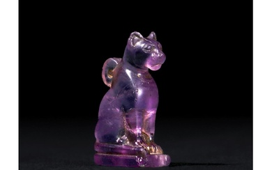 AN EGYPTIAN AMETHYST CAT AMULET LATE PERIOD TO PTOLEMAIC PER...