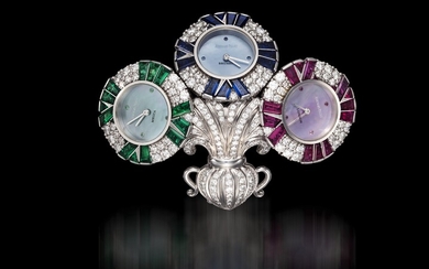 AUDEMARS PIGUET, A UNIQUE GOLD BROOCH WITH 3 QUARTZ WATCHES SET WITH DIAMONDS, RUBIES, SAPPHIRES, AND EMERALDS, ENGRAVED NO. 1