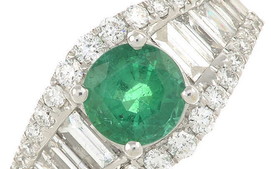 An 18ct gold emerald and vari-cut diamond dress ring.