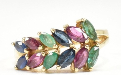 An 18ct gold, emerald, sapphire and ruby cluster ring. The r...