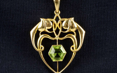An Art Nouveau 15ct gold peridot foliate pendant.