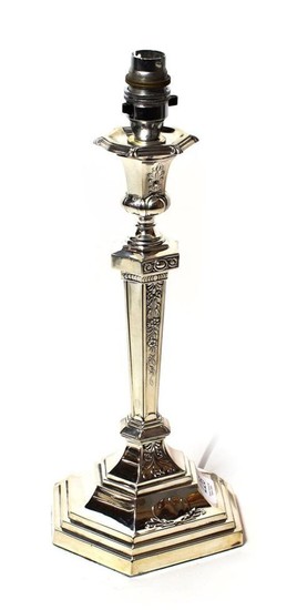 An Edward VII silver candlestick, by John Round & Son...