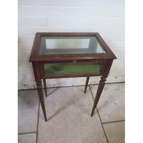 An Edwardian style bijouterie display table in square taperi...