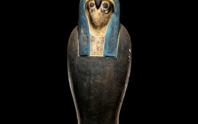 An Egyptian Wood Falcon Sarcophagus